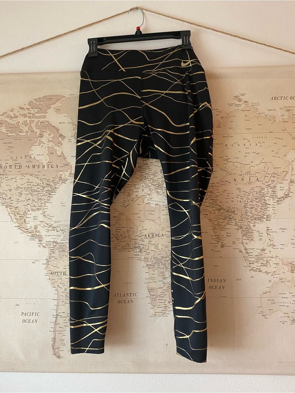 Nike Black Leggings with Gold Wave Lines